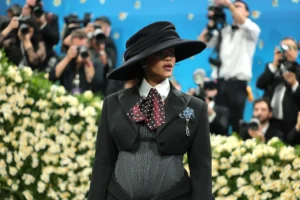 Pregnant Rihanna shows off baby bump in bustier and deconstructed suit on Met Gala 2025 red carpet
